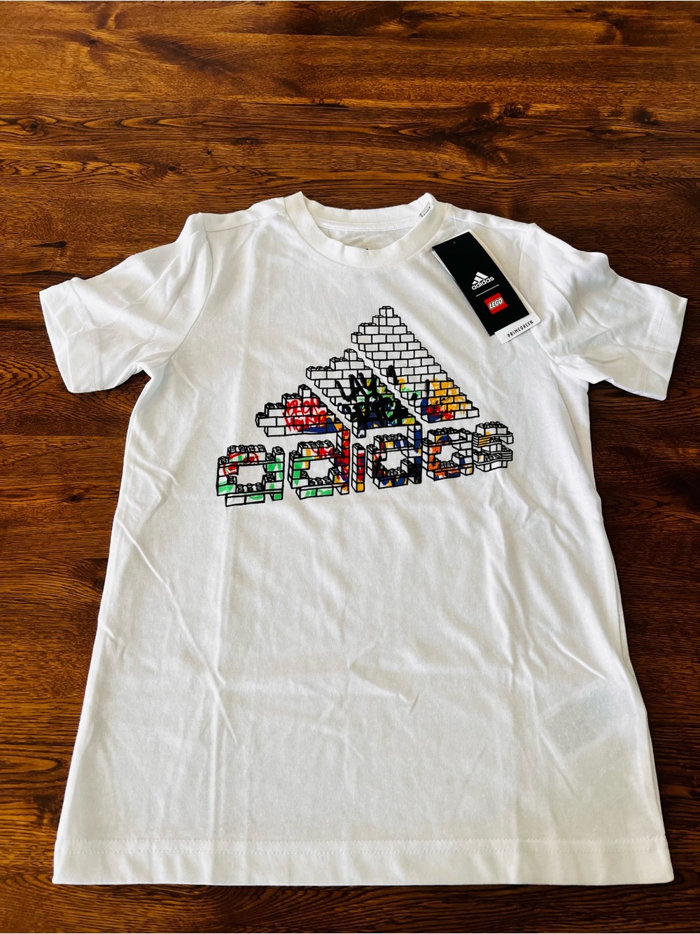 Kids Adidas NWT Lego T-shirt with Lego brick logo size Small 9-10 Year